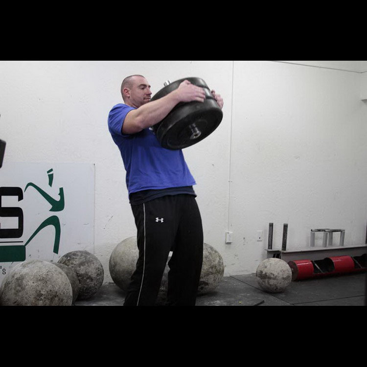 техника выполнения упражнения: Упражнение Атлас стоун или Камень Атласа (Atlas Stone Trainer) на фото техника выполнения упражнения: Упражнение Атлас стоун или Камень Атласа (Atlas Stone Trainer) на фото