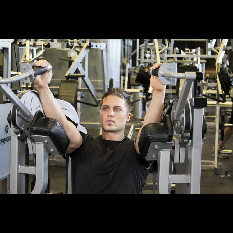 техника выполнения упражнения: Трицепсовая экстензия в тренажёре (Machine Triceps Extension) на фото