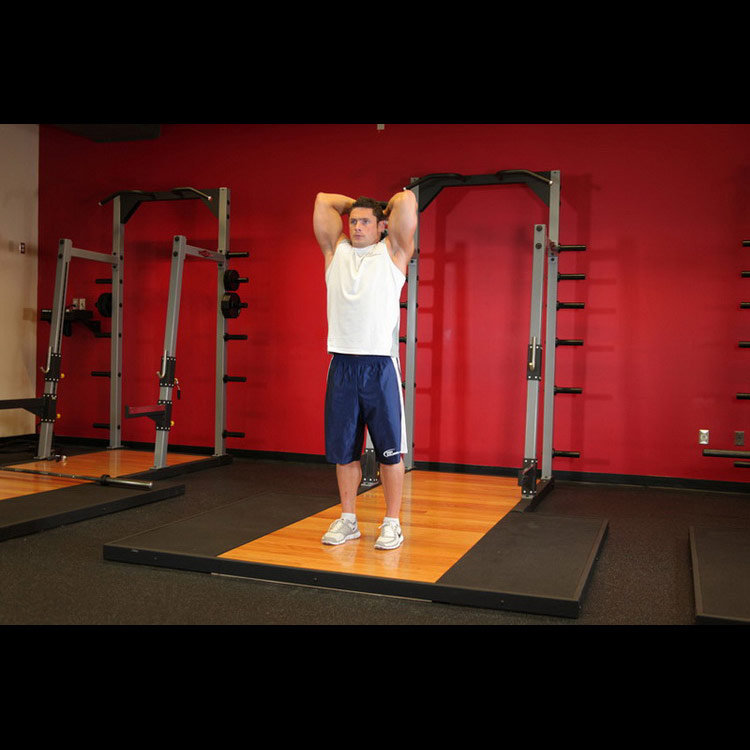 техника выполнения упражнения: Французский жим с гантелей стоя (Standing Dumbbell Triceps Extension) на фото