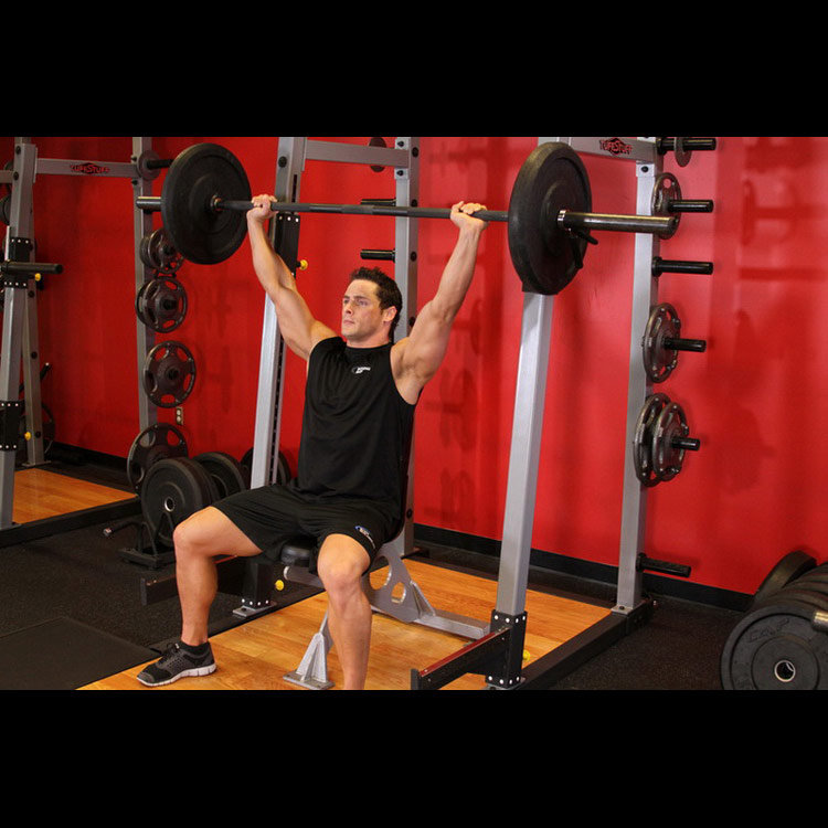 техника выполнения упражнения: Жим штанги сидя широким хватом (Barbell Shoulder Press) на фото техника выполнения упражнения: Жим штанги сидя широким хватом (Barbell Shoulder Press) на фото