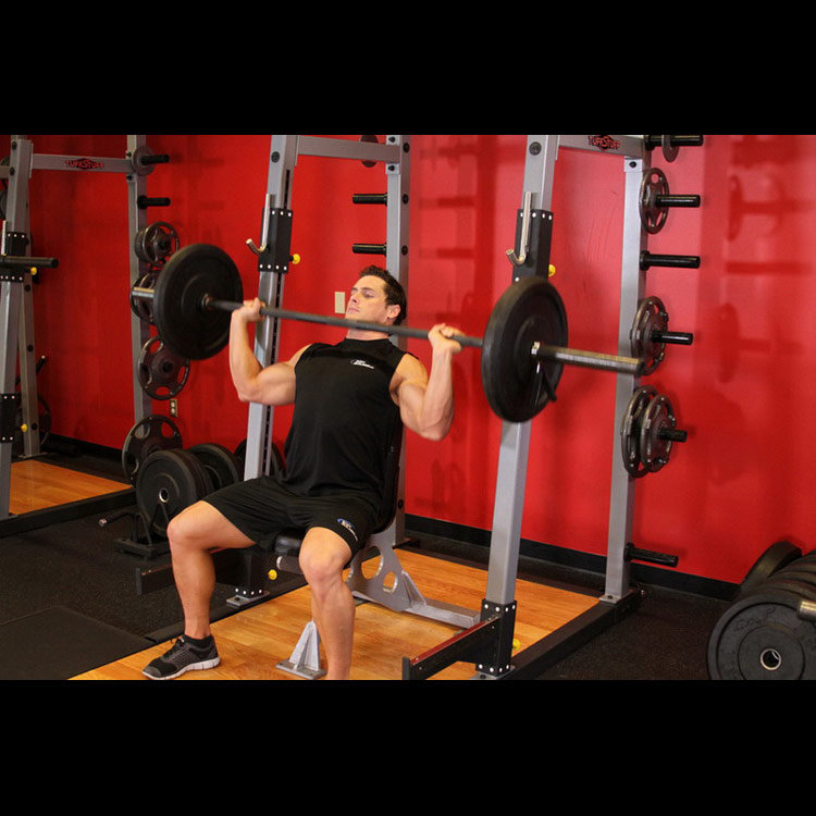 техника выполнения упражнения: Жим штанги сидя широким хватом (Barbell Shoulder Press) на фото техника выполнения упражнения: Жим штанги сидя широким хватом (Barbell Shoulder Press) на фото