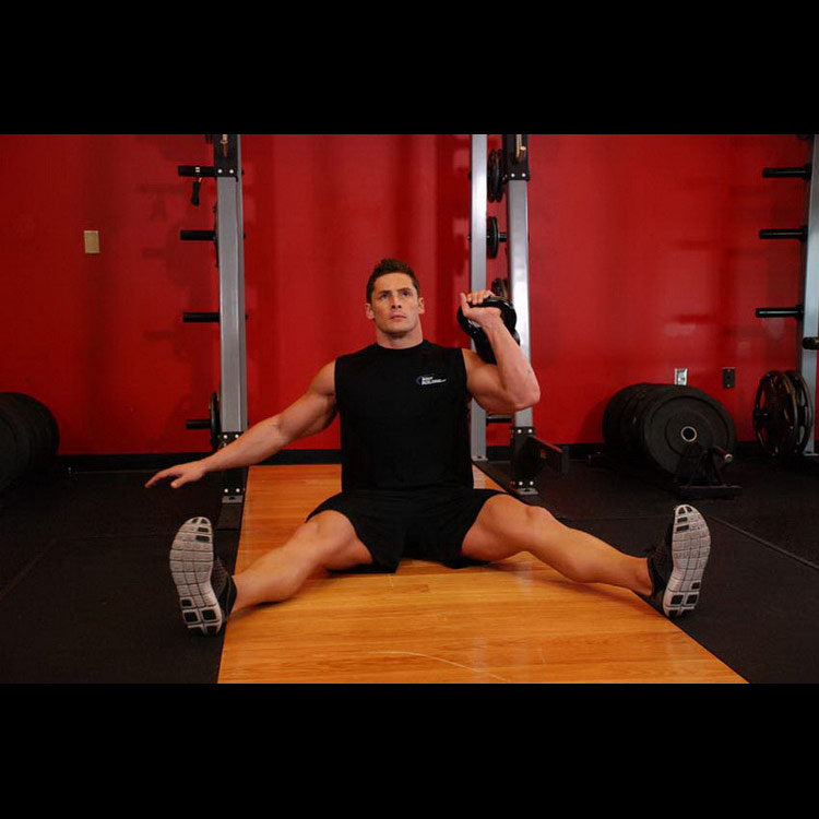 техника выполнения упражнения: Жим гири одной рукой сидя (Kettlebell Seated Press) на фото техника выполнения упражнения: Жим гири одной рукой сидя (Kettlebell Seated Press) на фото