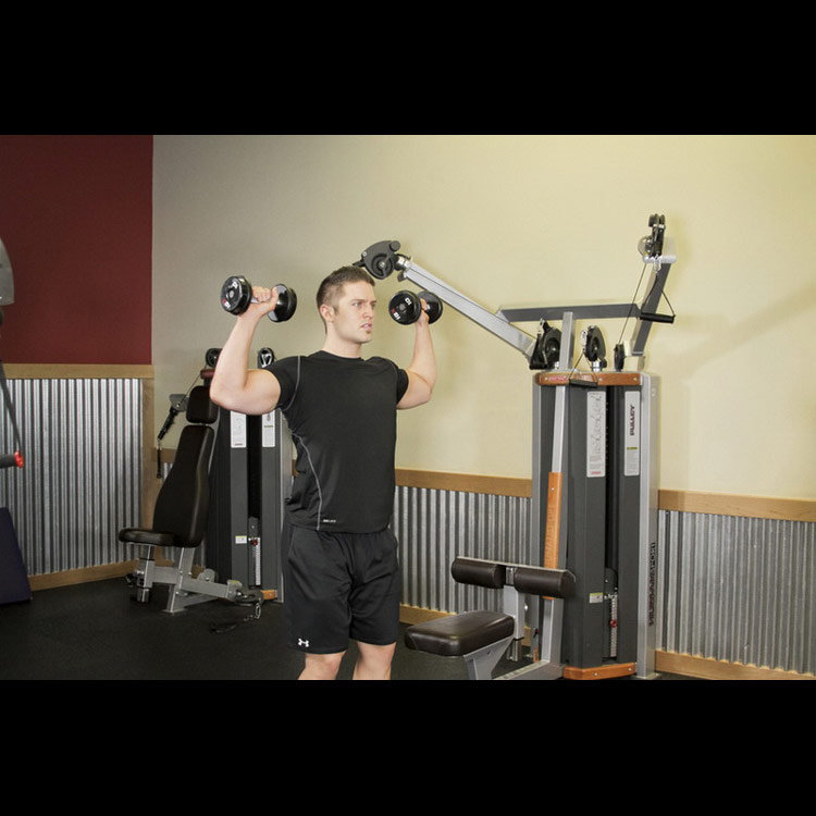 техника выполнения упражнения: Жим гантели стоя (Standing Dumbbell Press ) на фото техника выполнения упражнения: Жим гантели стоя (Standing Dumbbell Press ) на фото