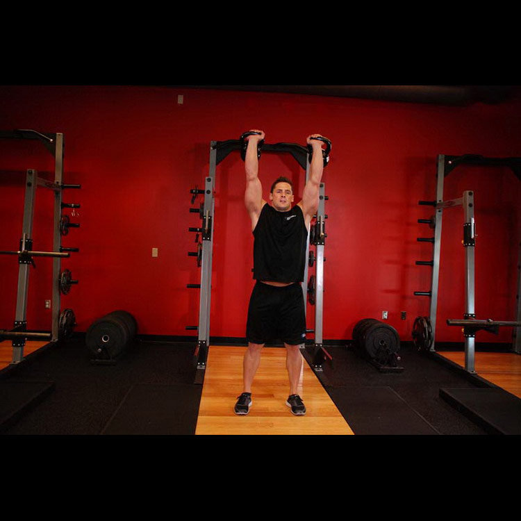 техника выполнения упражнения: Толчок гирь двумя руками (Two-Arm Kettlebell Jerk) на фото техника выполнения упражнения: Толчок гирь двумя руками (Two-Arm Kettlebell Jerk) на фото